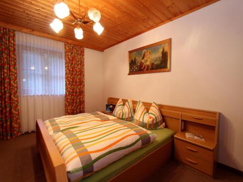 Una cama o camas en una habitación de Apartment Sulzau near Wildkogel Ski Slopes