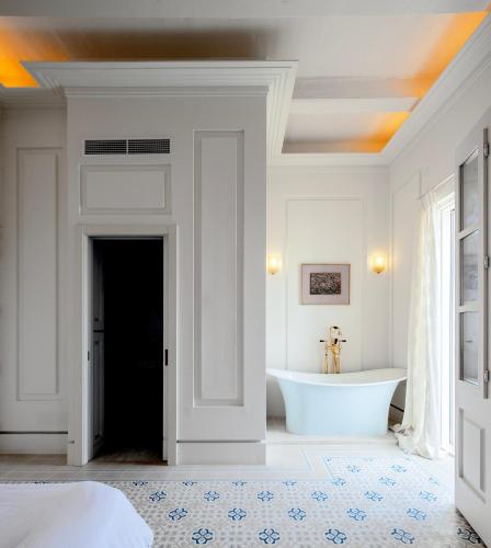 Katil atau katil-katil dalam bilik di Iniala Harbour House
