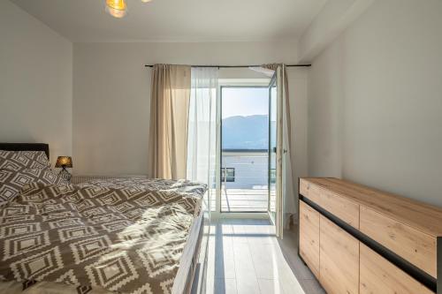 Ένα ή περισσότερα κρεβάτια σε δωμάτιο στο Citadel Residence