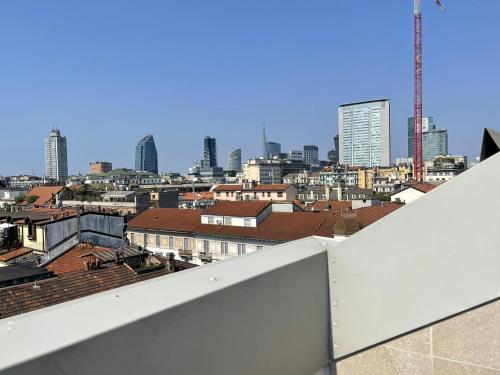 a view of a city from the roof of a building at Scarlatti Hotel Milano in Milan