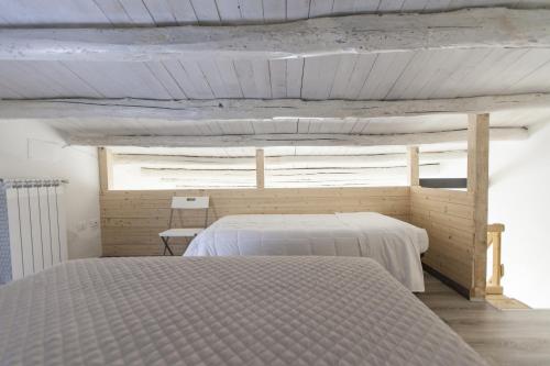 a bedroom with two beds in a room at B&B del Massimo in Palermo