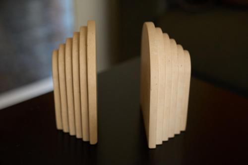 two wooden sticks sitting on top of a table at Skye urban oasis in Tripolis