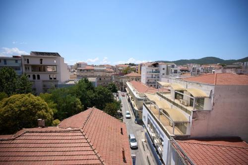 an aerial view of a city with buildings and cars at Skye urban oasis in Tripolis