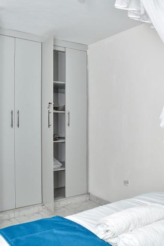 Atrium Apartmentsにあるベッド