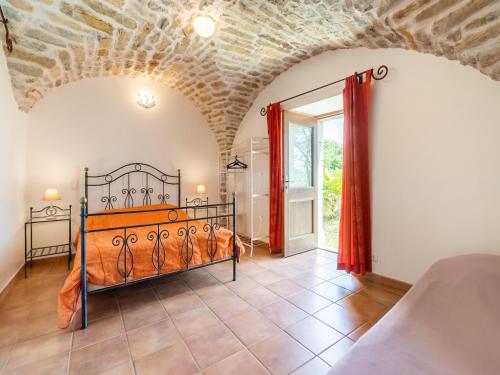 a bedroom with a bed in a room at Relaxing Family Stay in Les Vans in Chambonas