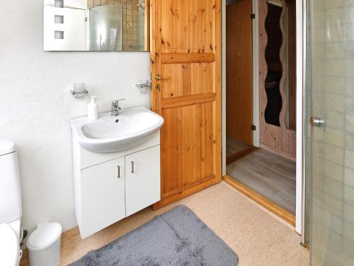 a bathroom with a sink and a toilet and a shower at Tranquil Haven in Ansager - By Traum Ferienwohnungen in Ansager