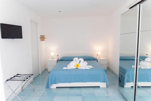 Ένα ή περισσότερα κρεβάτια σε δωμάτιο στο Hotel San Francesco