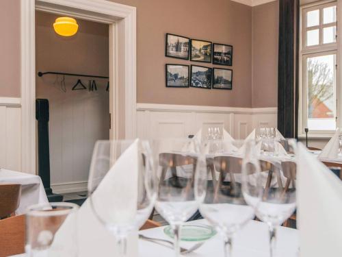 a group of wine glasses sitting on a table at 4 person holiday park home in Give in Give