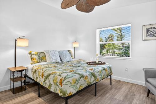 a bedroom with a bed and a window at Buffalo Bungalow in Clearwater Beach