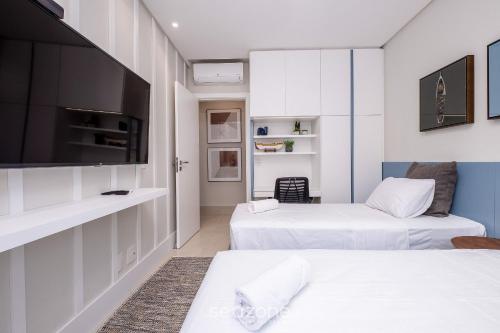 Postel nebo postele na pokoji v ubytování Cobertura c/jacuzzi e churrasq em Jurerê RVO401