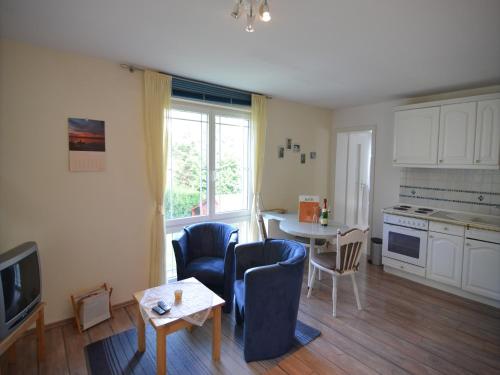 Η κουζίνα ή μικρή κουζίνα στο Schönow Forest Apartment