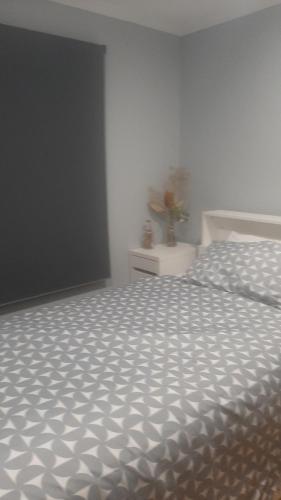 Una cama o camas en una habitación de Tia Margarita
