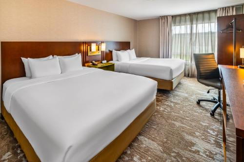 Ένα ή περισσότερα κρεβάτια σε δωμάτιο στο Comfort Inn