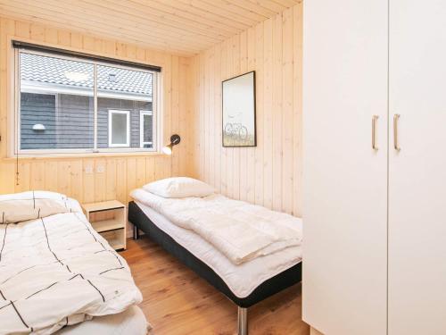 Ένα ή περισσότερα κρεβάτια σε δωμάτιο στο 18 person holiday home in Fjerritslev