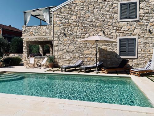 Swimmingpoolen hos eller tæt på Vi la Mare - Mediterranes Apartment-Feeling mit Poolgenuss