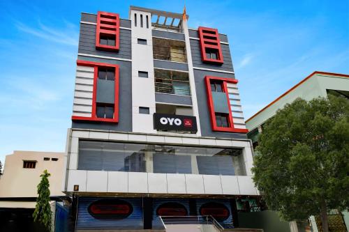 a building with an ovo sign on the side of it at Hotel O 5 Five Star in Upal