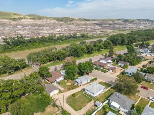 an aerial view of a small town with houses at The Coal Stone throw away from Red Deer River 2BR House in Drumheller