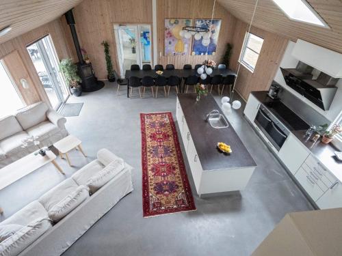 an overhead view of a living room with a table and chairs at Luxury Retreat with Pool - By Traum Ferienwohnungen in Tisvildeleje