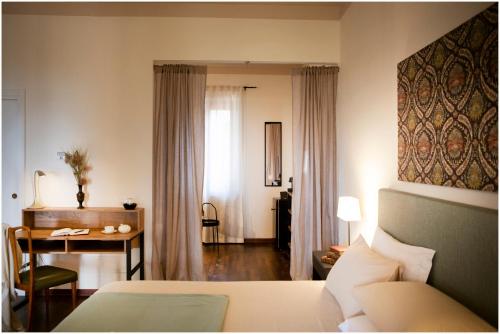 Ένα ή περισσότερα κρεβάτια σε δωμάτιο στο Bed and Breakfast Costa Etrusca