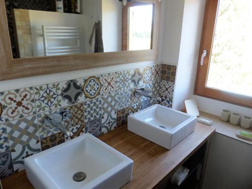 a bathroom with a white sink and a mirror at Private Pool in Provence in La Motte