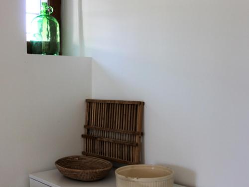 two baskets sitting on a counter in a room at Private Pool in Provence in La Motte