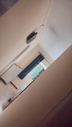 an overhead view of a room with a window at hotel laren in Sete Lagoas