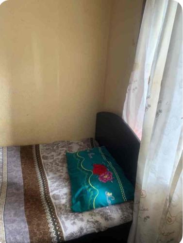 Llit o llits en una habitació de Muhammad Haseeb