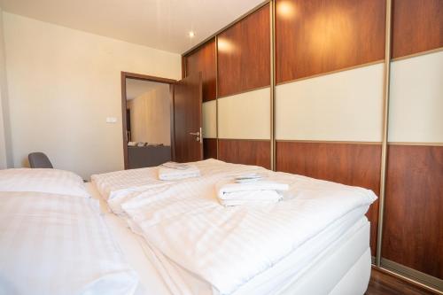 Кровать или кровати в номере Luxury apartment in city center