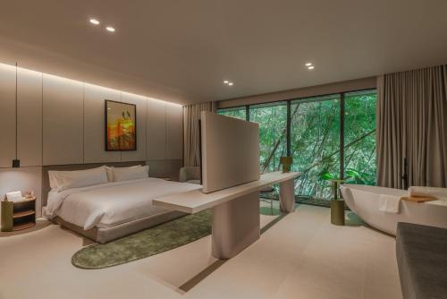 Katil atau katil-katil dalam bilik di Wake BioHotel