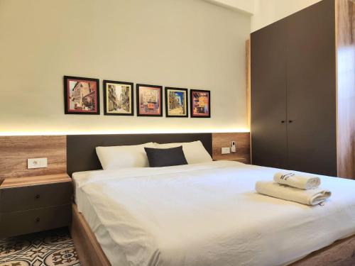 Llit o llits en una habitació de The Arabesque Comfortable Studio