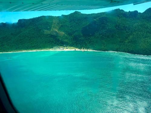 a view of a beach from an airplane at Tenuta Chatham Bay in Union Island