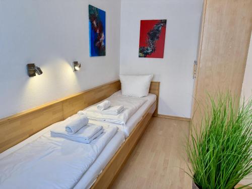 Ένα ή περισσότερα κρεβάτια σε δωμάτιο στο Dünennest