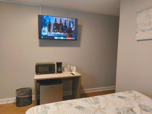Sand Dollar Motelにあるテレビまたはエンターテインメントセンター