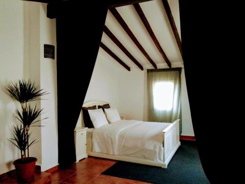 Ένα ή περισσότερα κρεβάτια σε δωμάτιο στο Charming townhouse with unique views