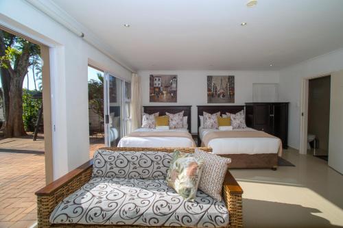 Cama o camas de una habitación en Umhlanga Self Catering Guest House