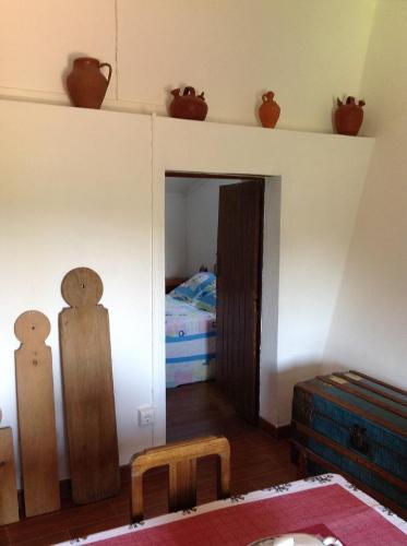 Ένα ή περισσότερα κρεβάτια σε δωμάτιο στο Refugio da Maceira