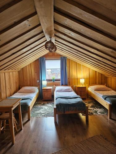 Ένα ή περισσότερα κρεβάτια σε δωμάτιο στο Niespodzianka