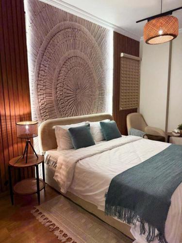 Giường trong phòng chung tại Luxury Apartment Near Makkah