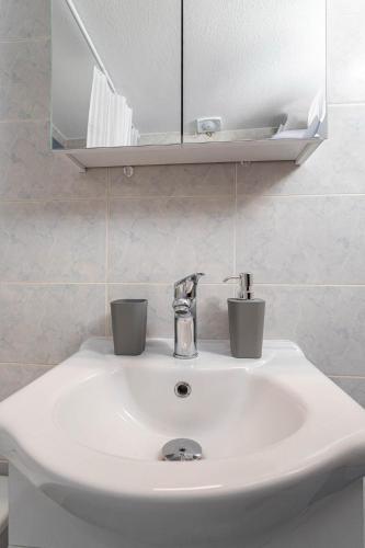 Ένα μπάνιο στο Tranquil Vibes Comfortable Apartment
