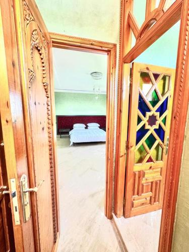 Postel nebo postele na pokoji v ubytování Villa H