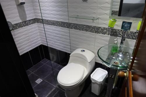 Un baño de Apartahotel El Horizonte
