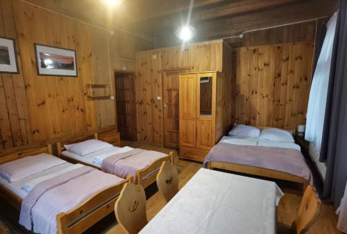 Ένα ή περισσότερα κρεβάτια σε δωμάτιο στο Niespodzianka