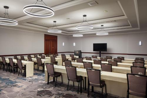 a conference room with a long table and chairs at Palace Hotel, a Luxury Collection Hotel, San Francisco in San Francisco