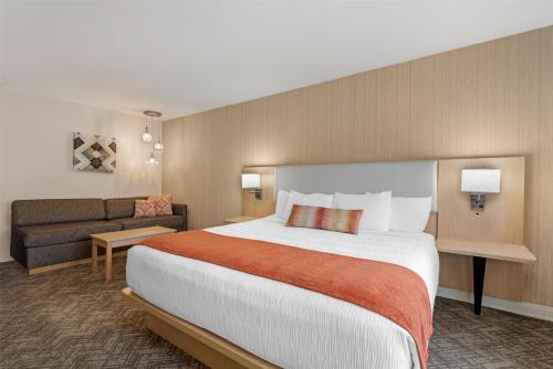 Ένα ή περισσότερα κρεβάτια σε δωμάτιο στο Best Western Vista Inn