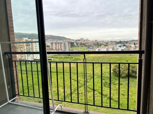 a balcony with a view of a city at Nuevo Apartamento frente al Centro Comercial VIVA in Tunja