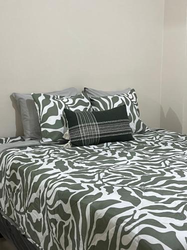 Ένα ή περισσότερα κρεβάτια σε δωμάτιο στο Apartamento Amaranto