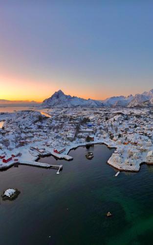 an aerial view of a city with a harbor at Unique Seaside home in Charming Kabelvåg - Lofoten in Kabelvåg