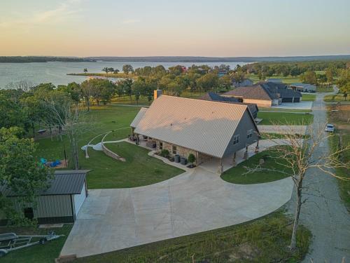 an overhead view of a large building with a playground at Stunning Eufaula Waterfront Home in Dixie Cove 