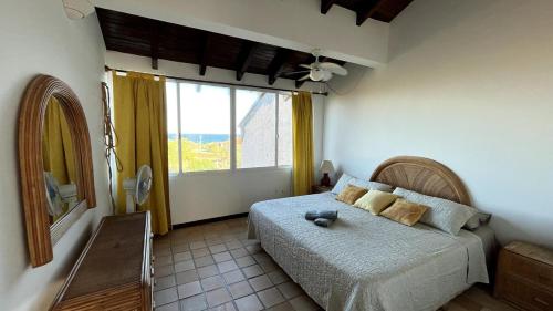 Postel nebo postele na pokoji v ubytování Escapada frente al mar