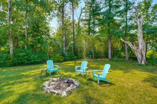 two chairs and a table next to a fire pit at 1 Mi to Dtwn Beautiful Home in Williamstown! in Williamstown